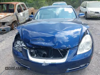2006 Lexus SC 430 z VIN JTHFN48Y669006546, wystawiony jako IAAI lot #42119904 z przebiegiem 93 250 mil mil oraz . Historia ofert i sprzedaży dostępna na DreamBid. Obrazek 6.