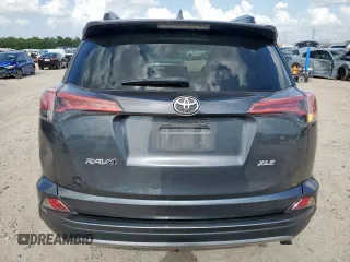 2018 Toyota RAV4 XLE with VIN 2T3WFREV2JW409292, listed as a Copart auction lot 61577355 with 189,258 mi miles and Salvage title. Bid and sale history available at DreamBid. Image 6.