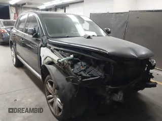 2006 Volkswagen Touareg 3.2L V6 with VIN WVGZG77L76D005849, listed as a IAAI auction lot 41582745 with 167,889 mi miles and . Bid and sale history available at DreamBid. Image 1.