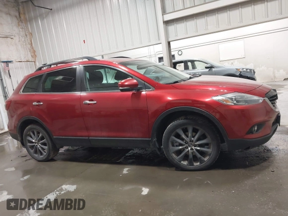 2015 Mazda CX-9 Grand Touring z VIN JM3TB3DAXF0464215, wystawiony jako IAAI lot #42043092 z przebiegiem 119 269 mil mil oraz . Historia ofert i sprzedaży dostępna na DreamBid. Obrazek 13.
