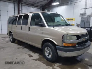 2012 Chevrolet Express Passenger 1LT z VIN 1GAZG1FAXC1127760, wystawiony jako IAAI lot #41629882 z przebiegiem 311 110 mil mil oraz . Historia ofert i sprzedaży dostępna na DreamBid. Obrazek 1.