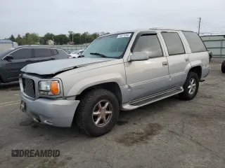 2000 GMC Denali with VIN 1GKEK13RXYR110436, listed as a Copart auction lot 74311244 with 250,735 mi miles and Salvage Title. Bid and sale history available at carsss.com. Image 1.