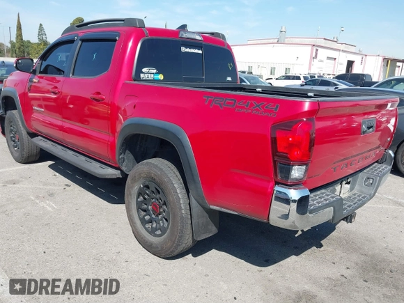 2018 Toyota Tacoma SR5 with VIN 3TMAZ5CN2JM067292, listed as a IAAI auction lot 41851959 with 70,988 mi miles and . Bid and sale history available at DreamBid. Image 3.