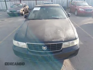 2002 Cadillac Seville Touring STS z VIN 1G6KY54972U193737, wystawiony jako IAAI lot #41876511 z przebiegiem 165 571 mil mil oraz . Historia ofert i sprzedaży dostępna na DreamBid. Obrazek 6.