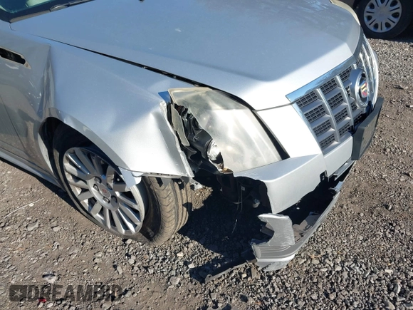 2012 Cadillac CTS Sedan Luxury with VIN 1G6DG5E50C0116725, listed as a IAAI auction lot 41694928 with 114,214 mi miles. Bid and sale history available at carsss.com. Image 6.