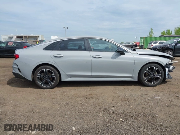 2023 Kia K5 GT-Line z VIN 5XXG64J26PG176483, wystawiony jako IAAI lot #42154614 z przebiegiem 61 050 mil mil oraz . Historia ofert i sprzedaży dostępna na DreamBid. Obrazek 13.