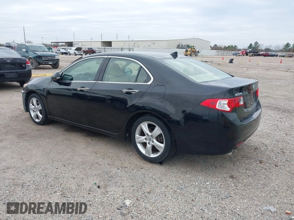 2010 Acura TSX with VIN JH4CU2F61AC041244, listed as a IAAI auction lot 41232564 with 82,604 mi miles. Bid and sale history available at carsss.com. Image 3.