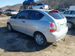 2007 Hyundai Accent GS with VIN KMHCM36C97U043769, listed as a IAAI auction lot 41526011 with 230,566 mi miles. Bid and sale history available at carsss.com. Image 3.