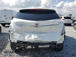 2024 Cadillac XT5 Premium Luxury AWD z VIN 1GYKNERS3RZ757814, wystawiony jako Copart lot #58976985 z przebiegiem 4 608 mil mil oraz Szkoda całkowita • Salvage title. Historia ofert i sprzedaży dostępna na DreamBid. Obrazek 6.
