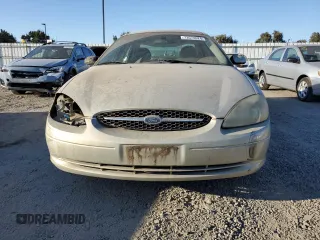 2003 Ford Taurus SE Standard with VIN 1FAFP53U13G188188, listed as a Copart auction lot 73574624 with 95,017 mi miles and Salvage Title. Bid and sale history available at DreamBid. Image 5.