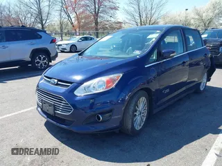 2016 Ford C-Max Energi SEL with VIN 1FADP5CU9GL102758, listed as a IAAI auction lot 41989630 with 103,410 mi miles. Bid and sale history available at carsss.com. Image 17.