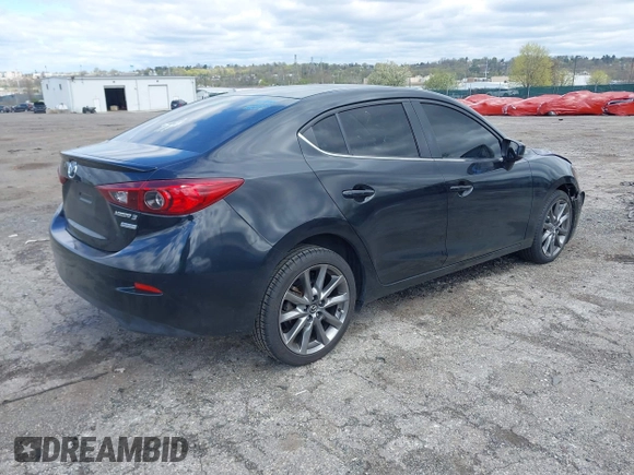 2018 Mazda 3 Touring with VIN 3MZBN1V35JM201844, listed as a IAAI auction lot 42051674 with 75,932 mi miles and . Bid and sale history available at DreamBid. Image 4.