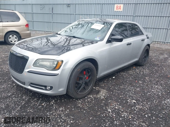 2012 Chrysler 300 Limited with VIN 2C3CCACG4CH246136, listed as a IAAI auction lot 41944107 with 137,270 mi miles. Bid and sale history available at carsss.com. Image 2.