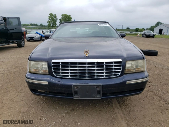 1997 Cadillac DeVille with VIN 1G6KD54Y2VU300250, listed as a Copart auction lot 66253444 with 0 mi miles and Clean Title. Bid and sale history available at carsss.com. Image 5.