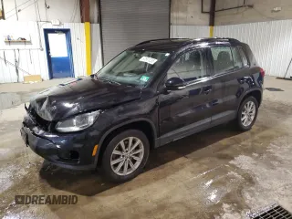 2018 Volkswagen Tiguan with VIN WVGBV7AX5JK001967, listed as a Copart auction lot 87931235 with 59,126 mi miles and Salvage Title. Bid and sale history available at DreamBid. Image 1.