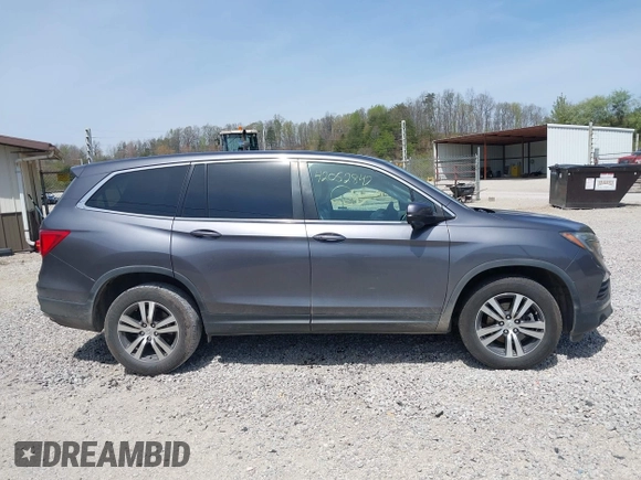 2018 Honda Pilot EX-L with VIN 5FNYF6H52JB066721, listed as a IAAI auction lot 42052842 with 134,393 mi miles and . Bid and sale history available at DreamBid. Image 13.