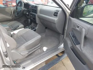 2004 Isuzu Rodeo S with VIN 4S2CK58W344311048, listed as a IAAI auction lot 41472392 with 128,732 mi miles. Bid and sale history available at carsss.com. Image 5.