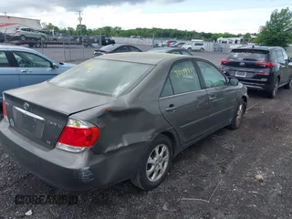 2005 Toyota Camry LE with VIN 4T1BF30K45U607301, listed as a IAAI auction lot 42199532 with Not Provided miles and . Bid and sale history available at DreamBid. Image 4.