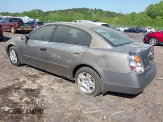 2002 Nissan Altima S with VIN 1N4AL11D32C291507, listed as a IAAI auction lot 41997253 with 199,769 mi miles. Bid and sale history available at carsss.com. Image 3.