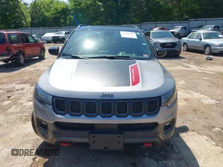 2023 Jeep Compass Trailhawk with VIN 3C4NJDDN3PT527995, listed as a IAAI auction lot 42218464 with 47,701 mi miles and . Bid and sale history available at carsss.com. Image 12.