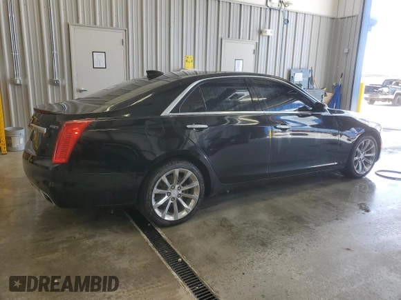 2016 Cadillac CTS Premium Collection AWD with VIN 1G6AZ5SX0G0104289, listed as a Copart auction lot 67733834 with 94,318 mi miles and Salvage title. Bid and sale history available at DreamBid. Image 3.