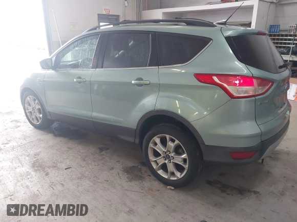 2013 Ford Escape SE with VIN 1FMCU0GX6DUC09872, listed as a IAAI auction lot 42020093 with 215,906 mi miles and . Bid and sale history available at DreamBid. Image 3.
