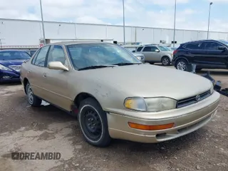1996 Toyota Camry DX with VIN 4T1BG12K7TU781388, listed as a IAAI auction lot 42089118 with 196,988 mi miles. Bid and sale history available at carsss.com. Image 1.