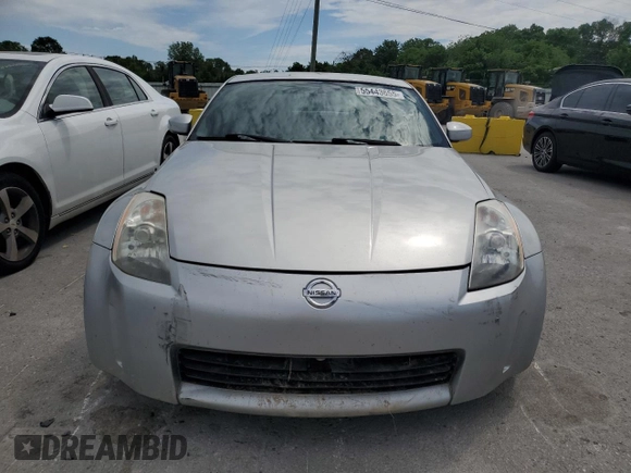2003 Nissan 350Z Performance z VIN JN1AZ34D63T102739, wystawiony jako Copart lot #55443655 z przebiegiem 162 672 mil mil oraz Tytuł czysty. Historia ofert i sprzedaży dostępna na DreamBid. Obrazek 5.