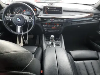 2015 BMW X6 xDrive35i with VIN 5UXKU2C50F0F94731, listed as a Copart auction lot 61715033 with 101,886 mi miles. Bid and sale history available at carsss.com. Image 8.