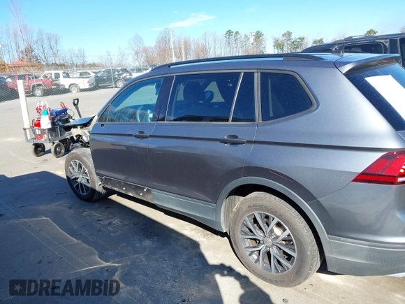 2021 Volkswagen Tiguan S with VIN 3VV1B7AX1MM044788, listed as a IAAI auction lot 41678069 with 91,665 mi miles and . Bid and sale history available at DreamBid. Image 15.