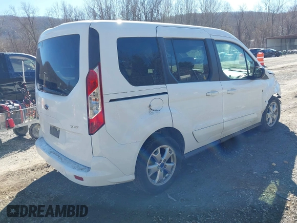 2014 Ford Transit Connect XLT z VIN NM0AE8F7XE1148356, wystawiony jako IAAI lot #41658732 z przebiegiem 128 180 mil mil oraz . Historia ofert i sprzedaży dostępna na DreamBid. Obrazek 4.