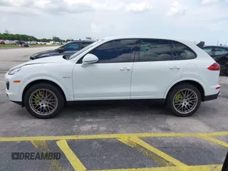2016 Porsche Cayenne S E-Hybrid with VIN WP1AE2A25GLA63698, listed as a IAAI auction lot 42694555 with 141,957 mi miles and . Bid and sale history available at DreamBid. Image 14.