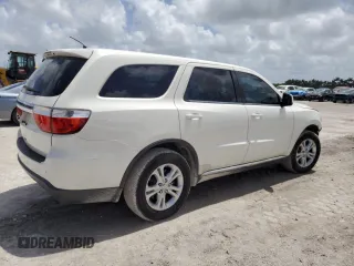 2012 Dodge Durango SXT z VIN 1C4RDHAG0CC329788, wystawiony jako Copart lot #61101745 z przebiegiem 208 302 mil mil oraz Szkoda całkowita • Salvage title. Historia ofert i sprzedaży dostępna na DreamBid. Obrazek 3.