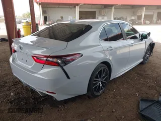 2023 Toyota Camry SE with VIN 4T1G11AK4PU105737, listed as a IAAI auction lot 41936590 with 31,066 mi miles. Bid and sale history available at carsss.com. Image 4.