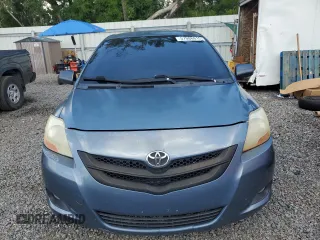 2009 Toyota Yaris z VIN JTDBT903X91297199, wystawiony jako Copart lot #57088615 z przebiegiem 161 170 mil mil oraz Szkody całkowita. Historia ofert i sprzedaży dostępna na DreamBid. Obrazek 5.