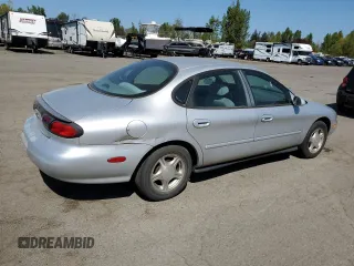 1999 Ford Taurus SE with VIN 1FAFP53U9XG171645, listed as a Copart auction lot 53187385 with 180,644 mi miles and Clean title. Bid and sale history available at DreamBid. Image 3.