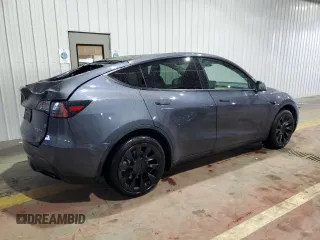 2023 Tesla Model Y Long Range z VIN 7SAYGDEE8PF814874, wystawiony jako Copart lot #56546365 z przebiegiem 20 919 mil mil oraz Szkoda całkowita • Salvage title. Historia ofert i sprzedaży dostępna na DreamBid. Obrazek 3.