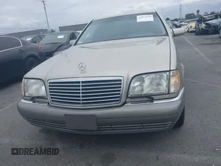 1996 Mercedes-Benz S with VIN WDBGA57E8TA318326, listed as a IAAI auction lot 42072979 with 97,504 mi miles and . Bid and sale history available at DreamBid. Image 6.