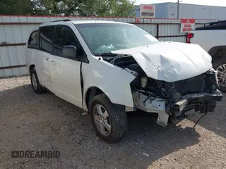 2009 Dodge Grand Caravan SE z VIN 1D8HN44E19B507123, wystawiony jako IAAI lot #42640527 z przebiegiem 258 002 mil mil oraz . Historia ofert i sprzedaży dostępna na DreamBid. Obrazek 1.