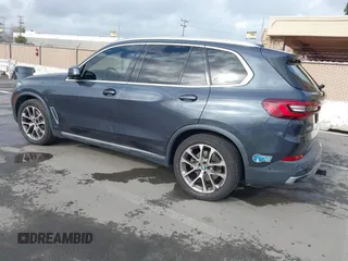 2021 BMW X5 xDrive45e with VIN 5UXTA6C09M9D26035, listed as a IAAI auction lot 41788981 with 60,571 mi miles and . Bid and sale history available at DreamBid. Image 3.