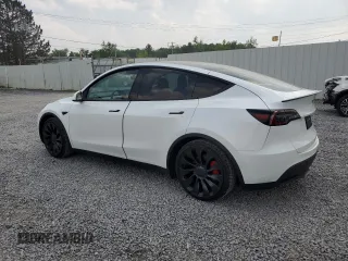 2022 Tesla Model Y Performance with VIN 7SAYGDEF1NF445085, listed as a Copart auction lot 58809495 with 14,832 mi miles and Salvage title. Bid and sale history available at DreamBid. Image 2.