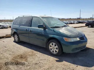 2003 Honda Odyssey EX-L with VIN 2HKRL18763H504100, listed as a Copart auction lot 45735815 with 267,723 mi miles and Clean title. Bid and sale history available at DreamBid. Image 4.