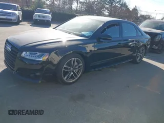 2017 Audi A8 with VIN WAU44AFD0HN017821, listed as a IAAI auction lot 41676097 with 107,378 mi miles and . Bid and sale history available at DreamBid. Image 17.