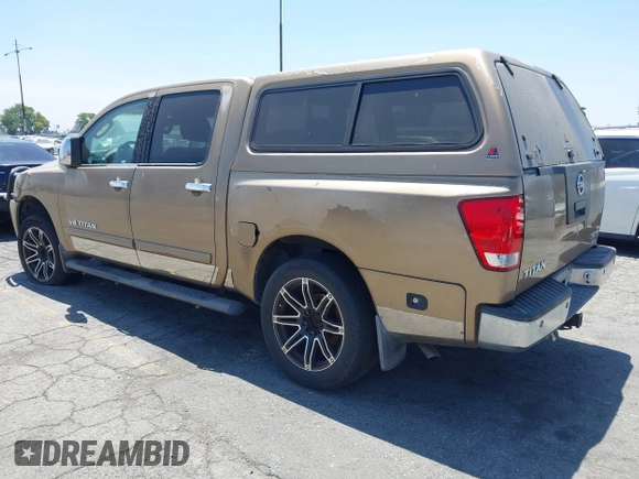 2005 Nissan Titan LE with VIN 1N6AA07B95N508001, listed as a IAAI auction lot 42656008 with 196,542 mi miles and . Bid and sale history available at DreamBid. Image 3.