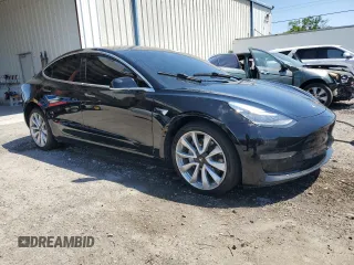 2019 Tesla Model 3 Mid Range z VIN 5YJ3E1EA9KF314143, wystawiony jako Copart lot #53564335 z przebiegiem 77 168 mil mil oraz Szkoda całkowita • Salvage title. Historia ofert i sprzedaży dostępna na DreamBid. Obrazek 4.