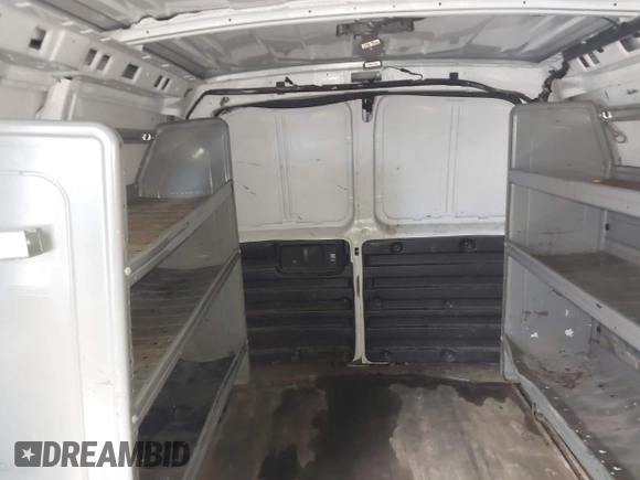 2020 Chevrolet Express Cargo with VIN 1GCWGAFP6L1275225, listed as a IAAI auction lot 41801450 with 122,683 mi miles and . Bid and sale history available at DreamBid. Image 18.