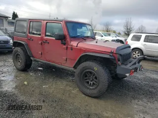 2012 Jeep Wrangler Unlimited Rubicon with VIN 1C4HJWFG2CL219021, listed as a Copart auction lot 87451784 with 109,675 mi miles and Salvage title. Bid and sale history available at DreamBid. Image 4.