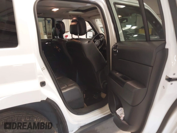 2014 Jeep Patriot Latitude with VIN 1C4NJPFA3ED739925, listed as a IAAI auction lot 41623546 with 130,374 mi miles and . Bid and sale history available at carsss.com. Image 8.