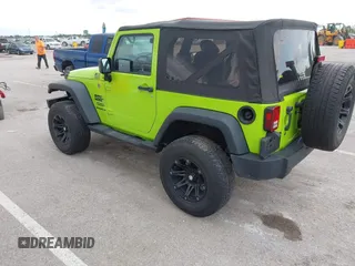 2013 Jeep Wrangler Sport with VIN 1C4AJWAG8DL507944, listed as a IAAI auction lot 42143144 with 70,085 mi miles and . Bid and sale history available at carsss.com. Image 3.