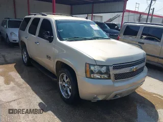 2009 Chevrolet Tahoe 2LT z VIN 1GNFC23049R154249, wystawiony jako IAAI lot #41994237 z przebiegiem 256 673 mil mil oraz . Historia ofert i sprzedaży dostępna na DreamBid. Obrazek 1.